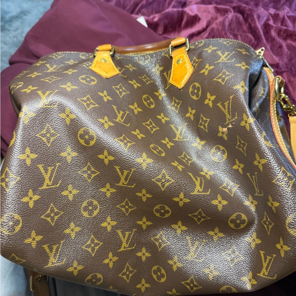 Louis Vuitton Brown and Yellow Travel Bags with Iconic Monogram